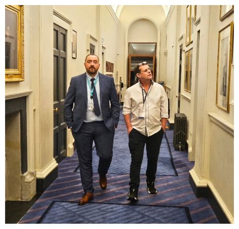 Charles & Denis walking in Dáil